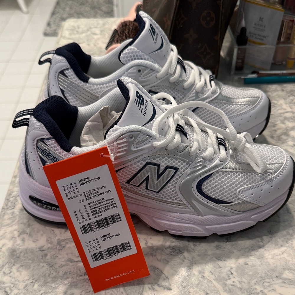 New Balance White and Navy Athletic Shoes
